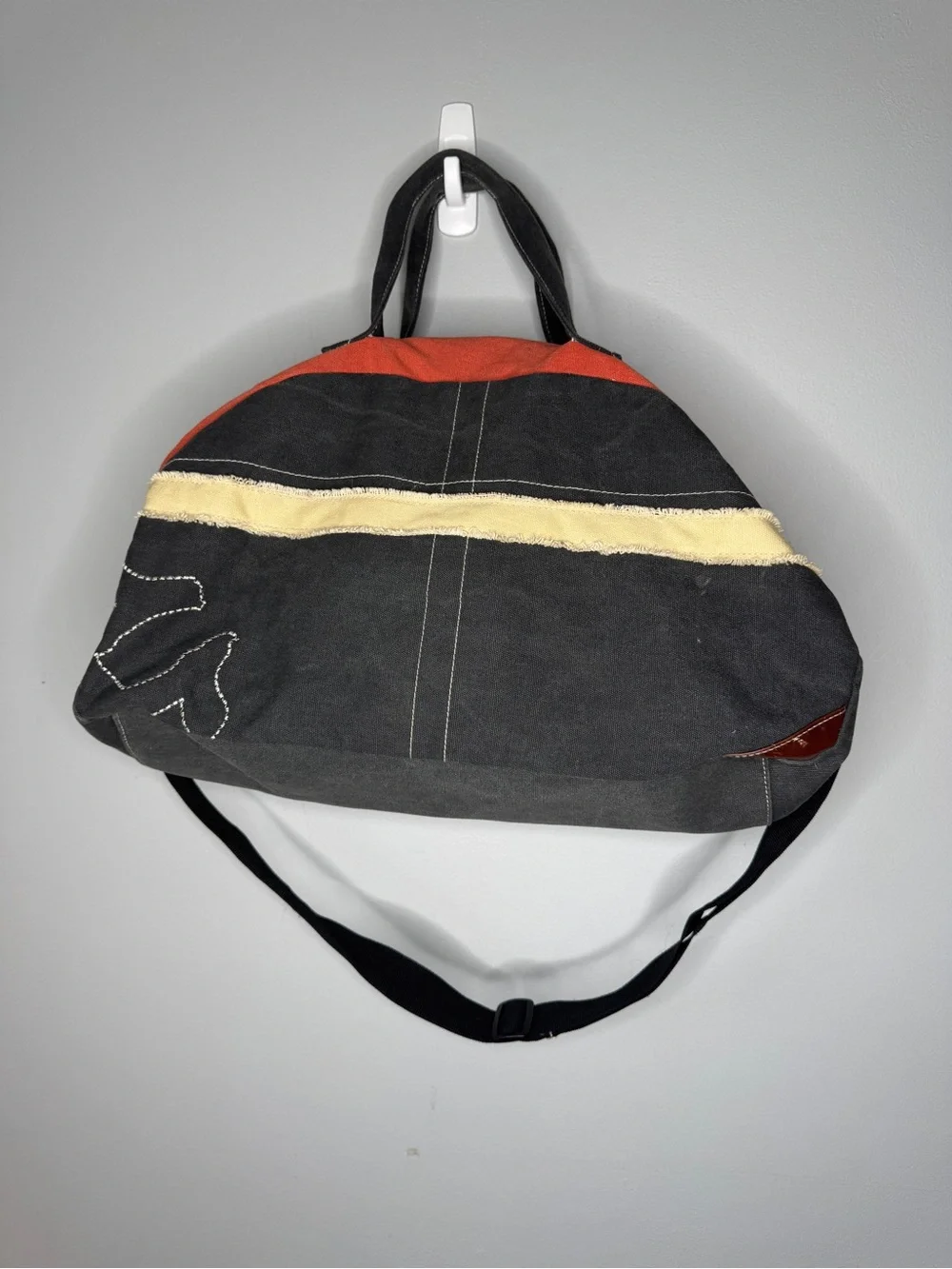 True Religion Black Duffel Bag with Red & Cream Stripes